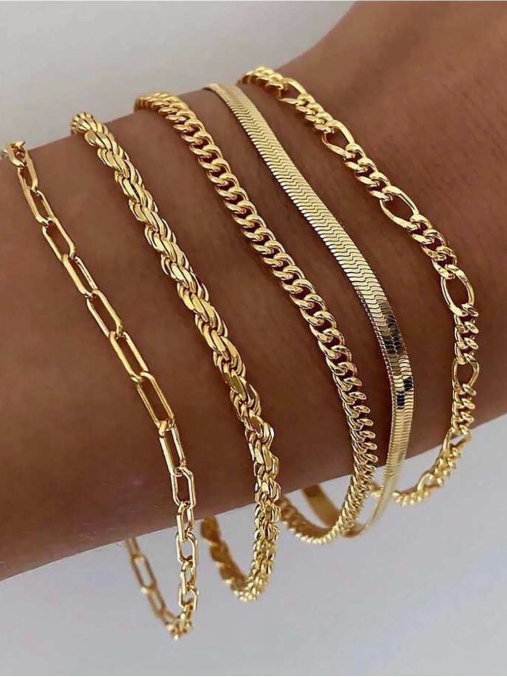 Set 5 gold bracelets